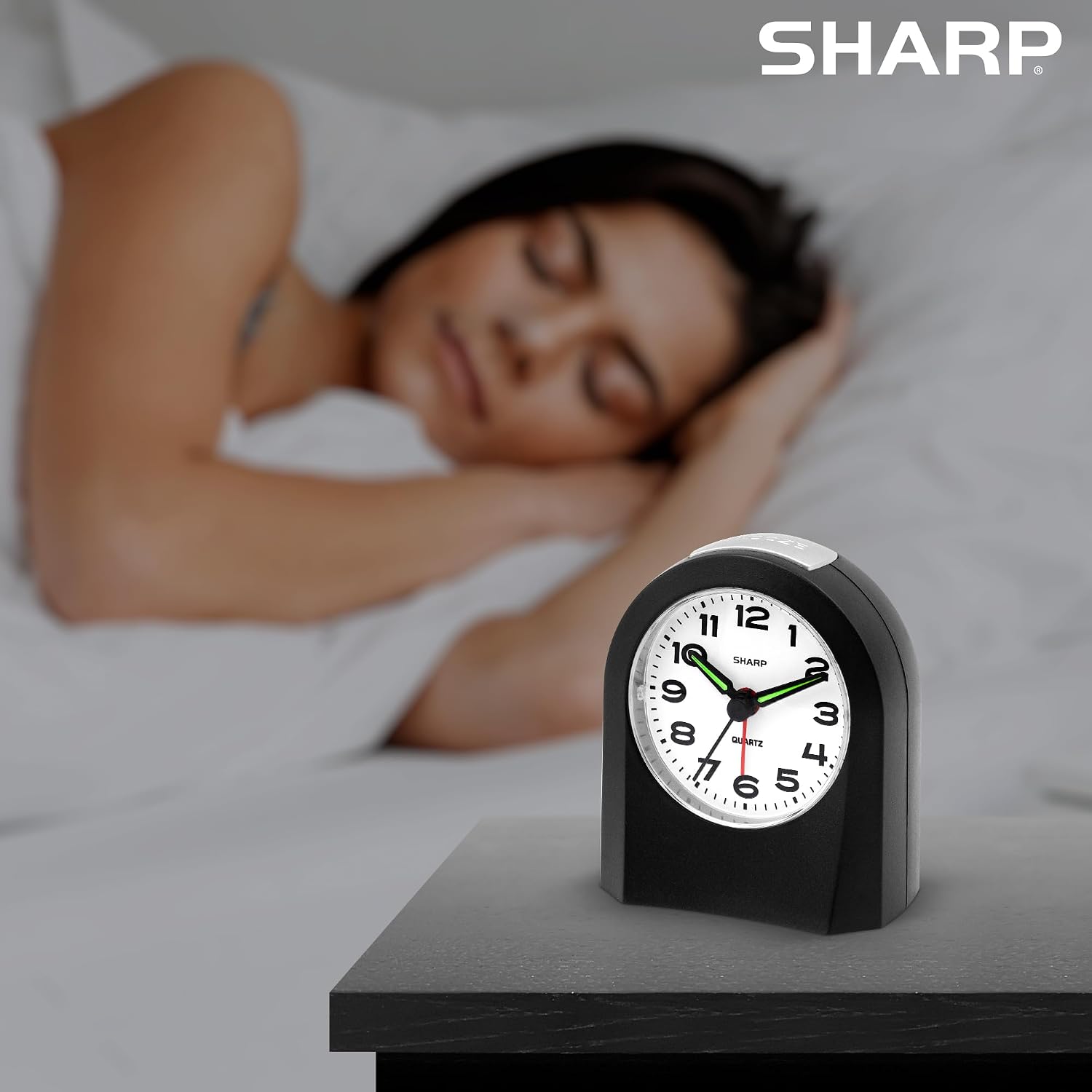 Sharp Battery-Powered Analog Alarm Clock, Silent Sweep, Snooze and Light | Silent no-tick movement; Ascending beep alarm; Gentle wake; Snooze; On-demand light; Compact size; Battery operated; Black