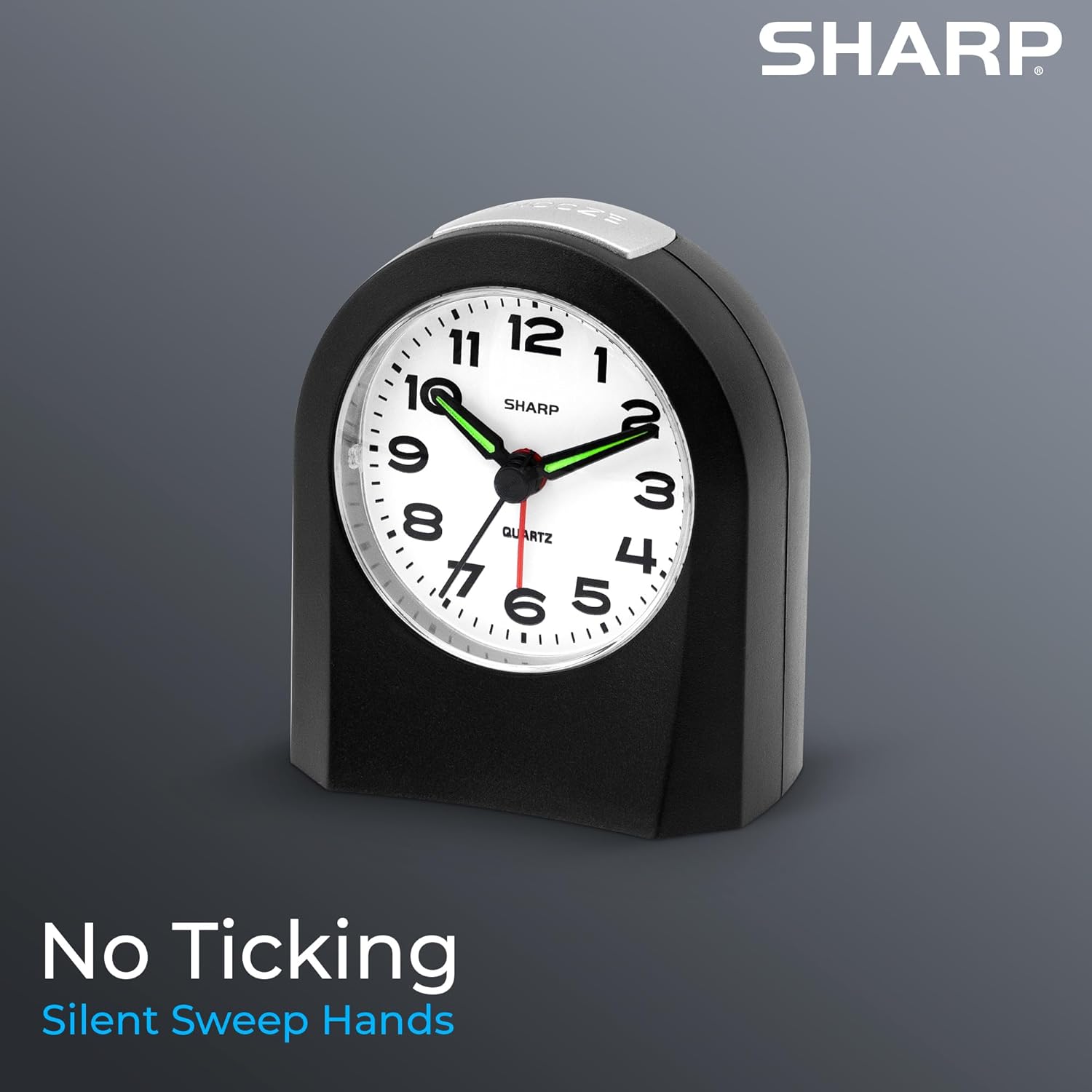 Sharp Battery-Powered Analog Alarm Clock, Silent Sweep, Snooze and Light | Silent no-tick movement; Ascending beep alarm; Gentle wake; Snooze; On-demand light; Compact size; Battery operated; Black